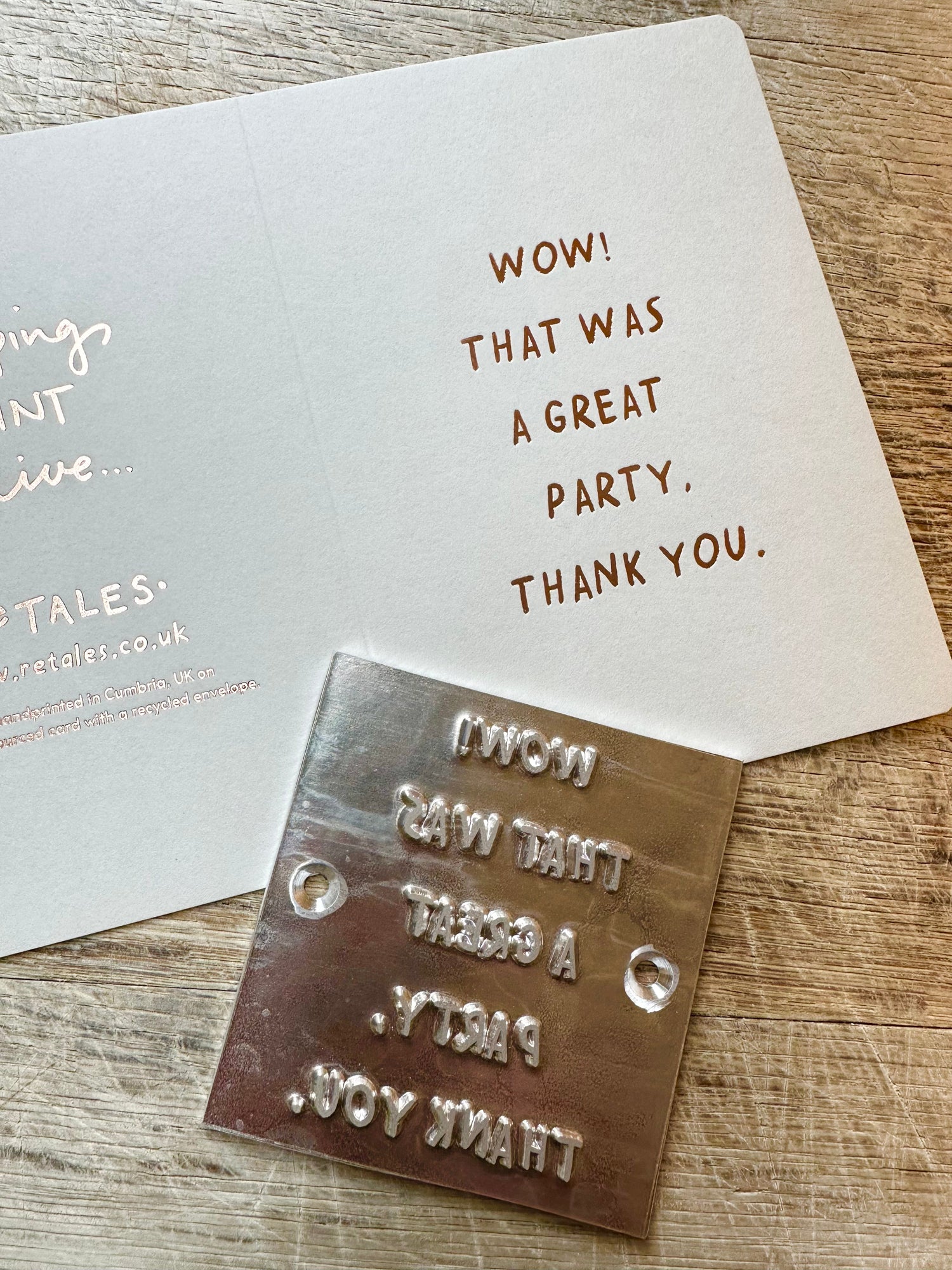 Greeting card with supportive text about the best things in life, hand printed on a pale grey luxury card and using a rose gold foil.
